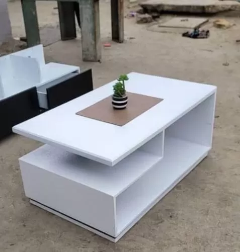 Table for sale: It is a centre coffe table and probably in good condition. This is a Furniture listi