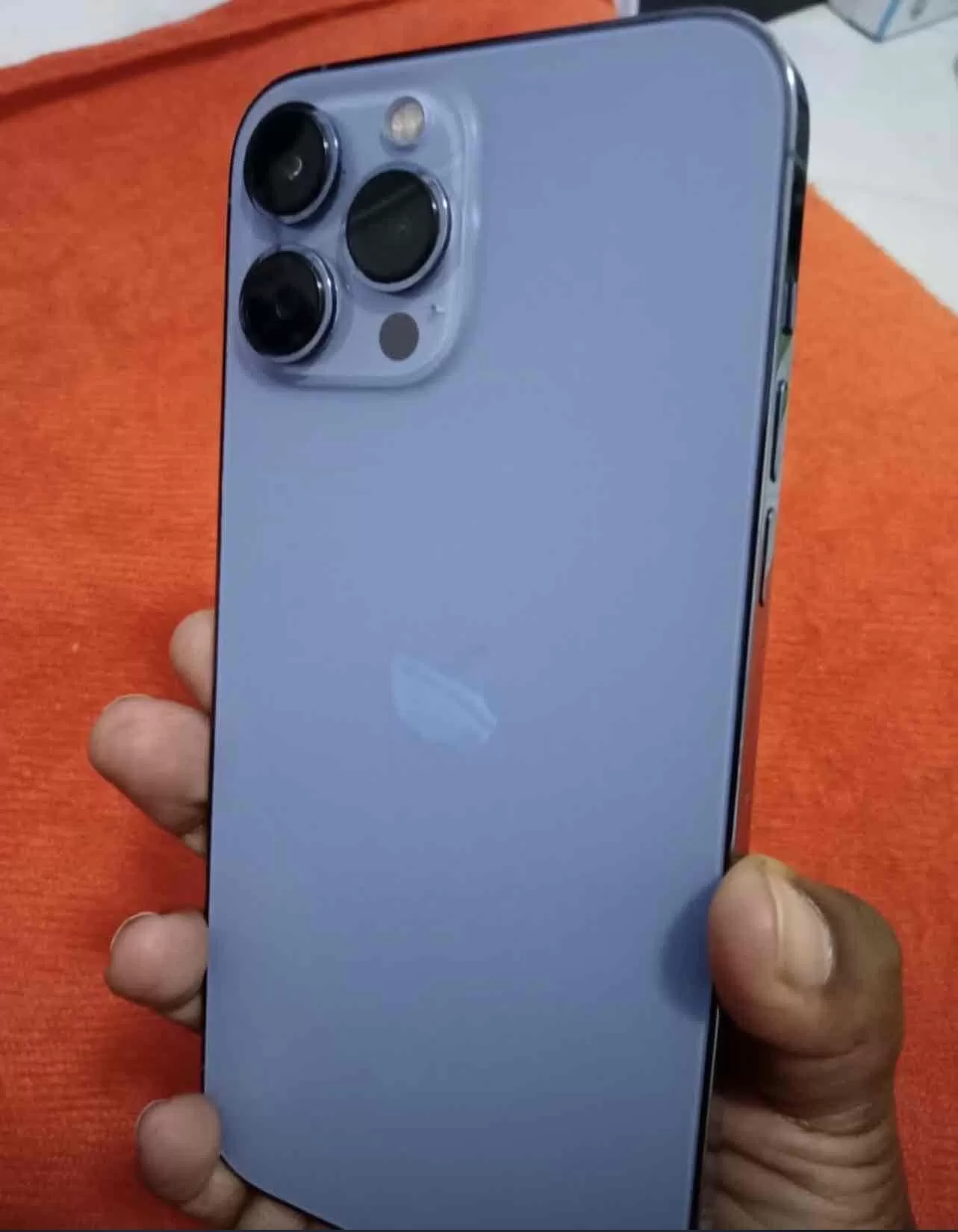 iPhone 13 Pro Max in good condition with no cracks, slightly used and fully functional.