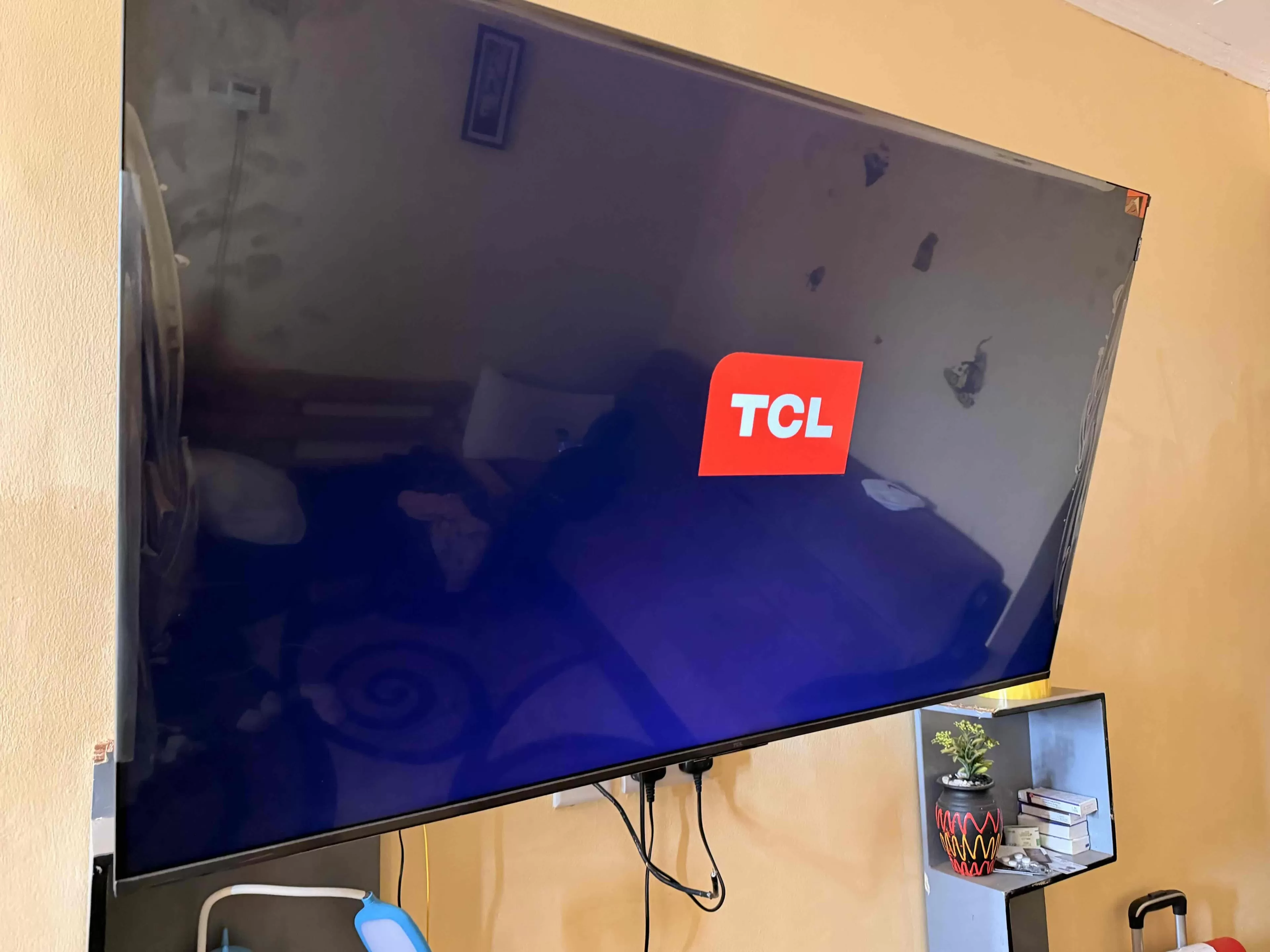 TCL 55-inch QLED premium TV with high-quality display and smart features.