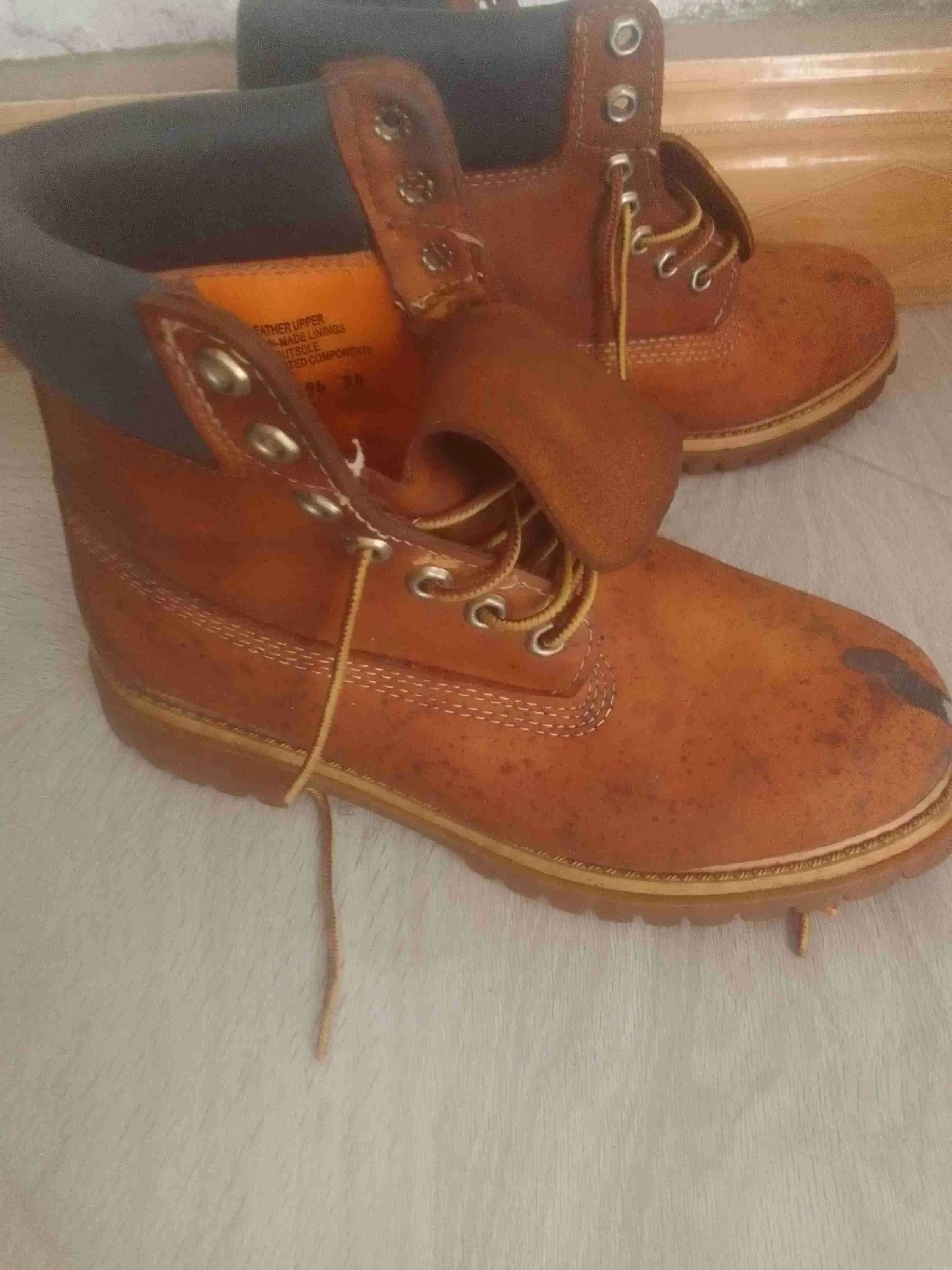 Trendy Timberland brown boots, water-friendly and suitable for all-weather stylish wear.