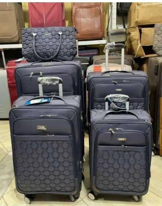 Classy suit case set with a hand bag: Reliable and durable. This is a Bags & Luggage listing with cl
