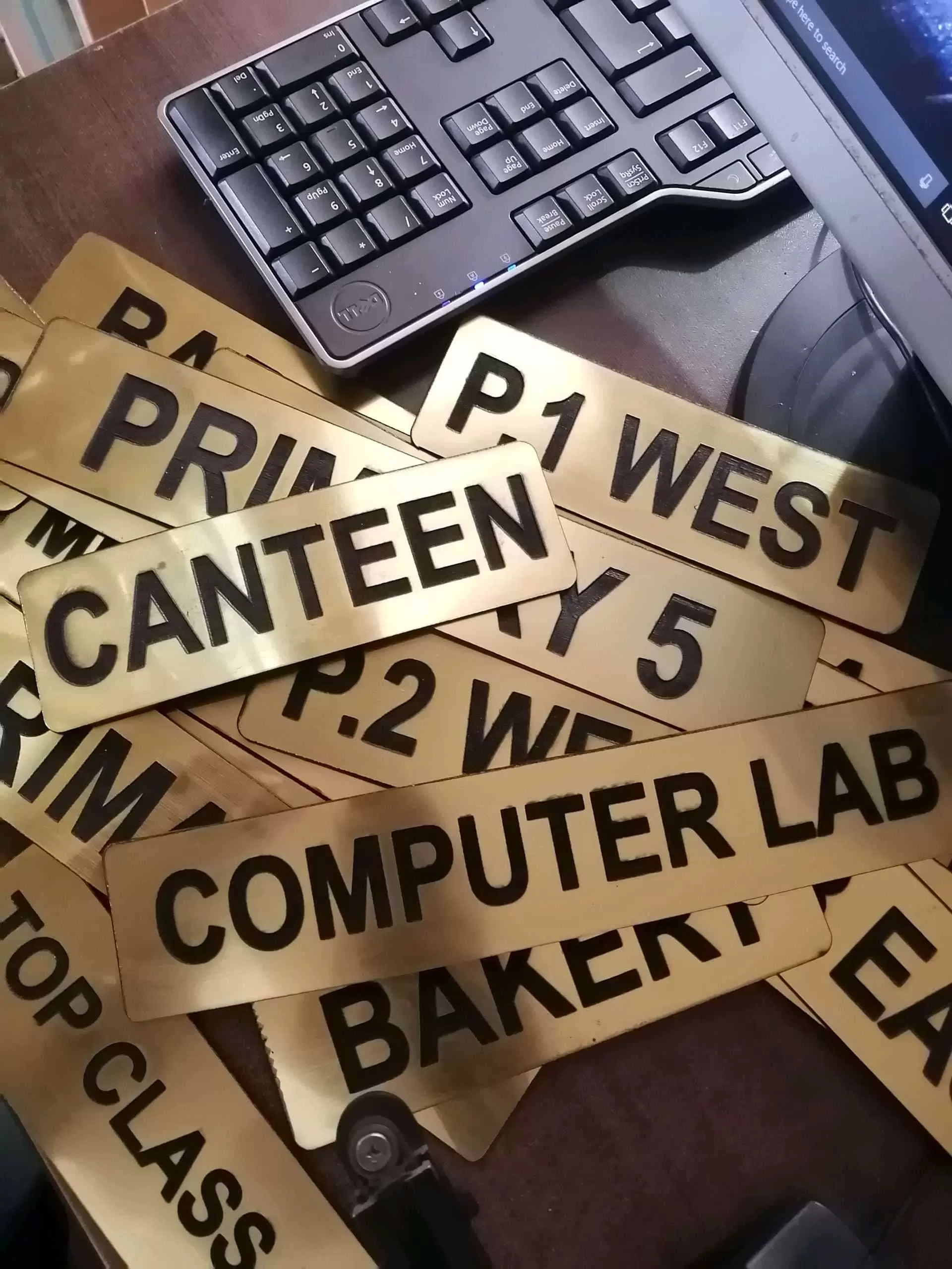 Door Labels: Our products are customised to give you the best of your brand. This is a Gaming listin